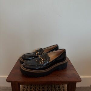 Sam Edelman Black Loafers with Brown Trim and Gold Buckle